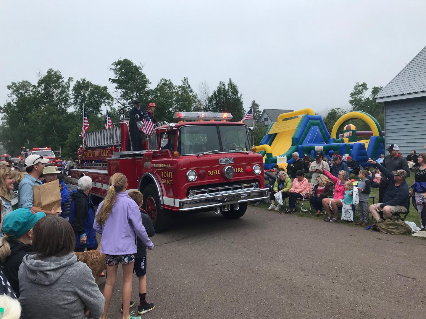 Red fire truck in a parade @ Tofte 4th of July