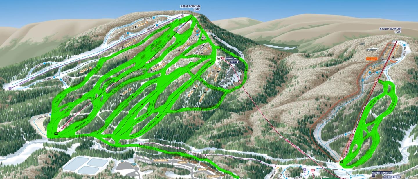 Ski resort map with green trails on mountainous terrain.